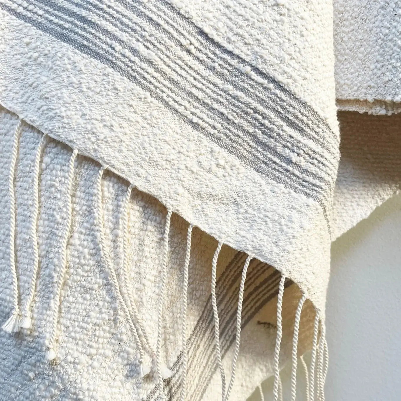 Dounia home bath/beach towel in Stone / ivory made of Cotton, Model: Salma, Close Up View