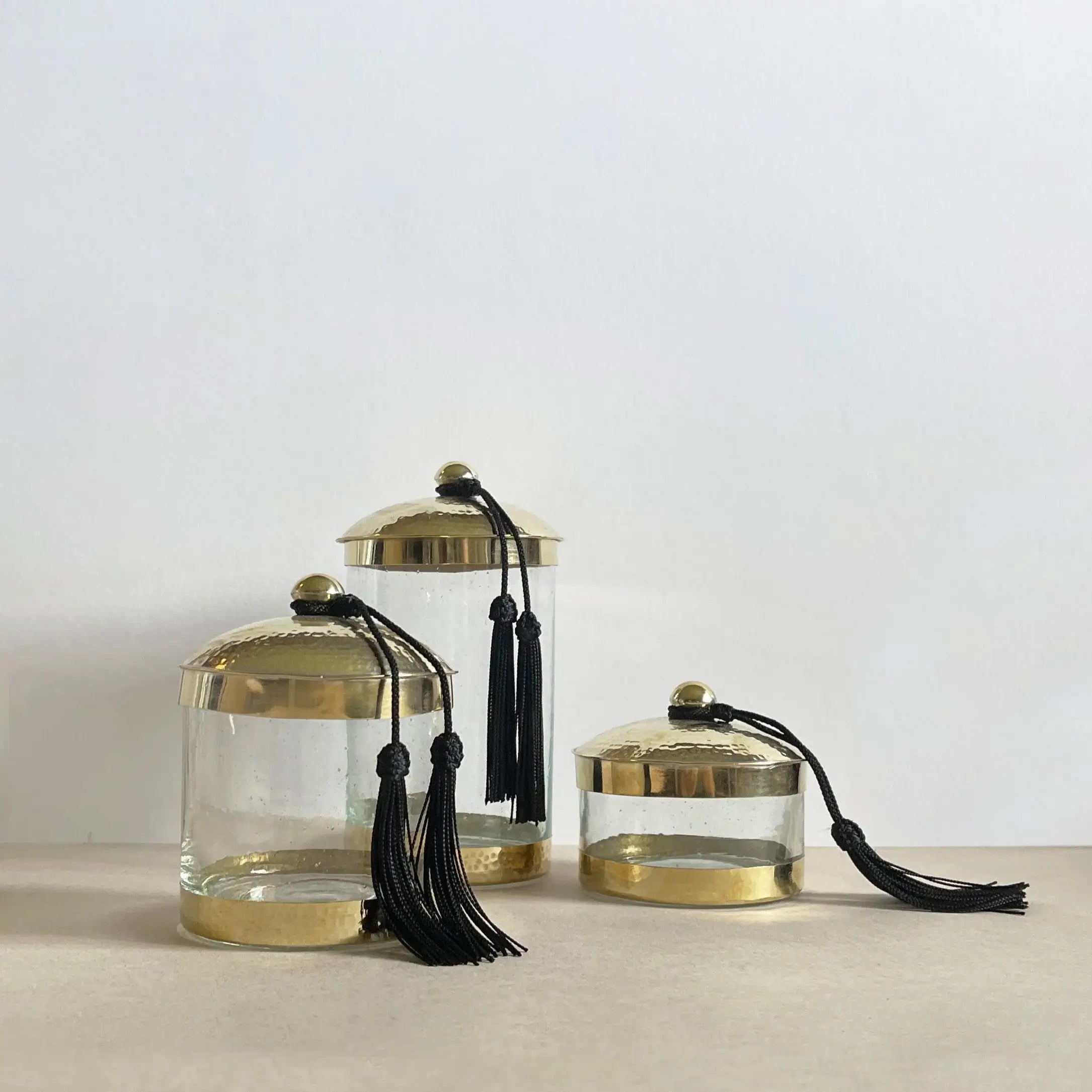 Dounia home apothecary jar in brass made of glass, 