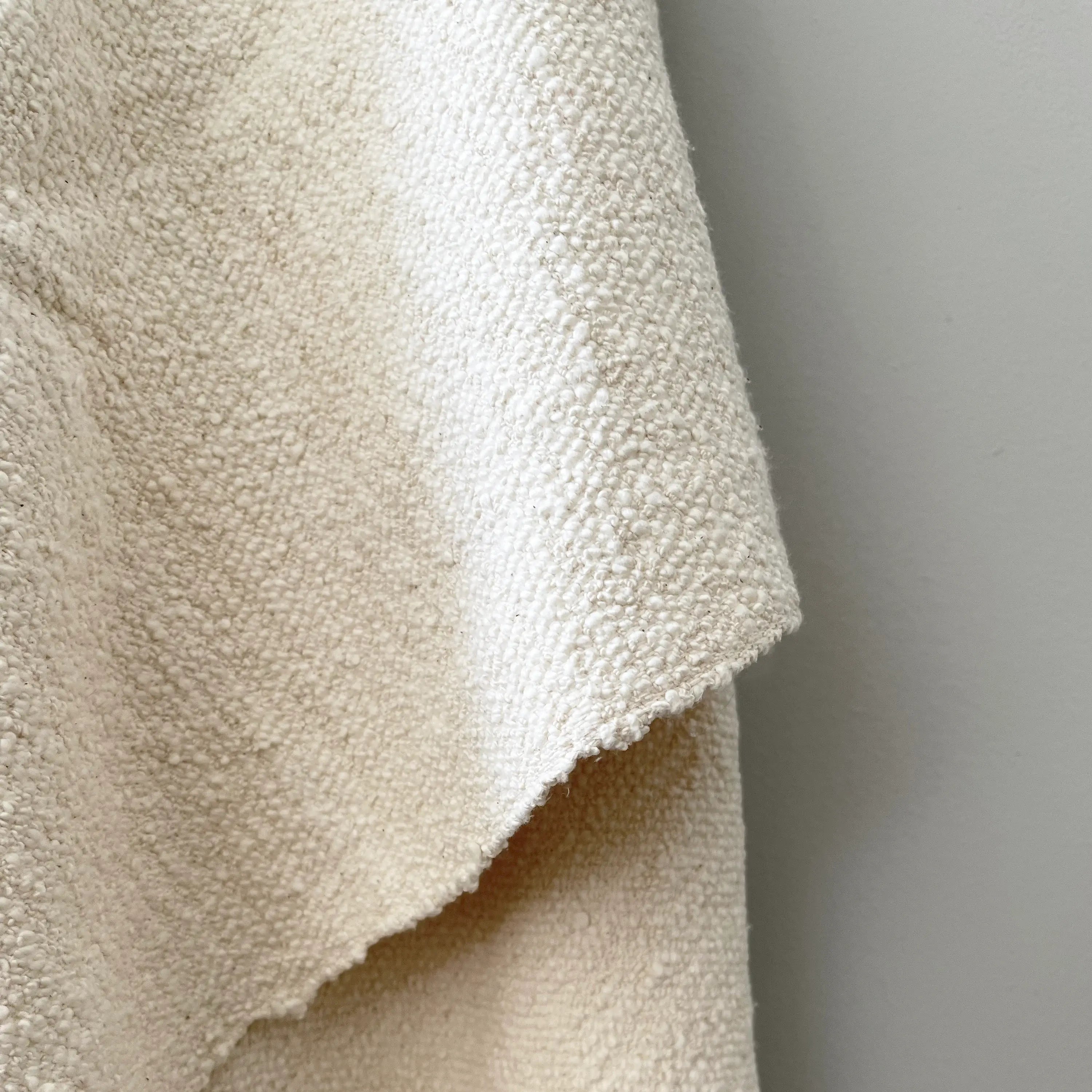 Dounia home bath/ beach towel in Ivory made of Organic cotton, Model: Baya, Close Up View
