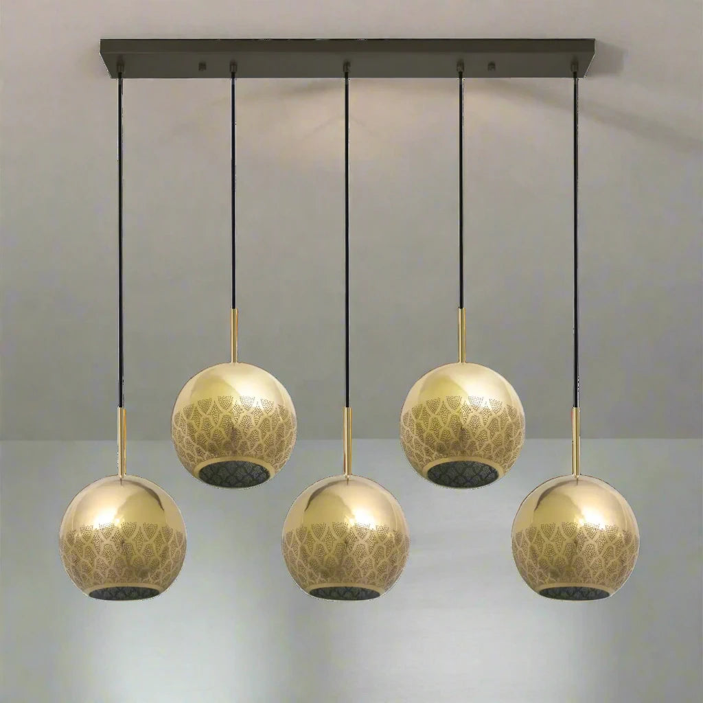 Dounia home chandelier in Polished brass  made of Metal, Model: Nur